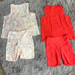 NWOT Old Navy activewear sets. Beautiful coral red and swirl sets.